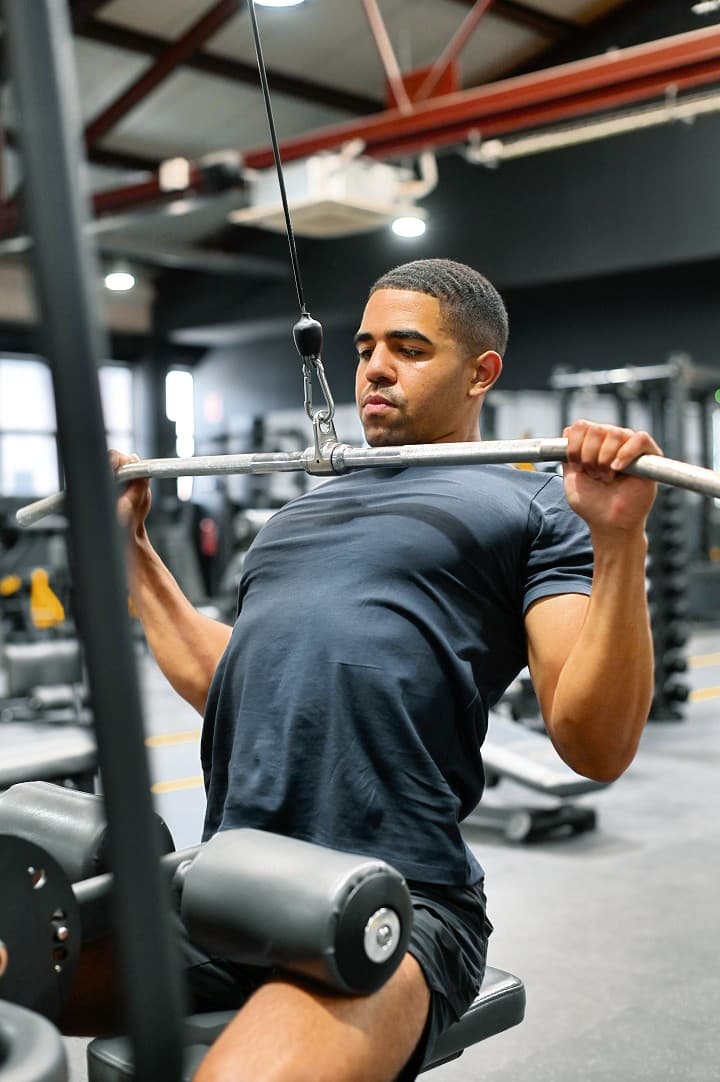 Athlete training with barbell